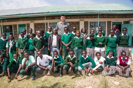 Yao Ming Poses with Students at a School in Ol Pejeta